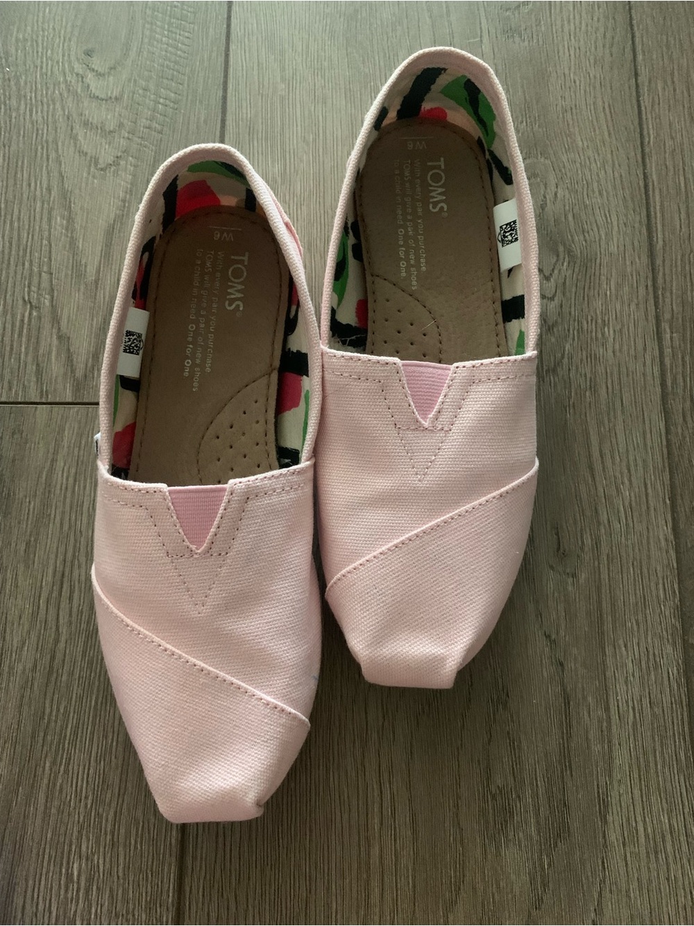Like new pink Toms!